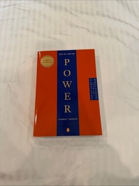 The 48 Laws of Power by Robert Greene - Red & Blue Paperback